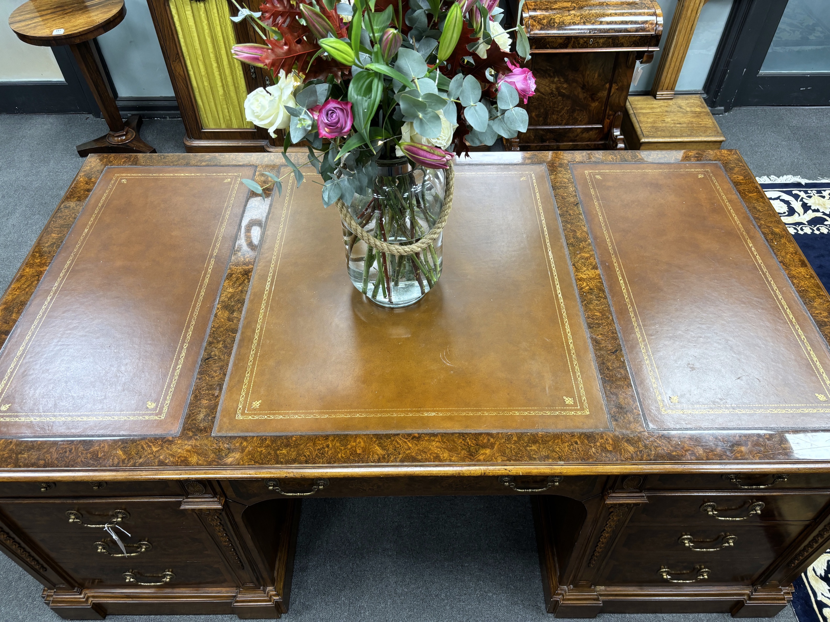 A George III style burr walnut pedestal partner's desk, width 193cm, depth 107cm, height 76cm